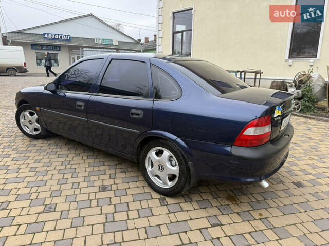 Синій Опель Вектра, об'ємом двигуна 2 л та пробігом 248 тис. км за 2550 $, фото 24 на Automoto.ua