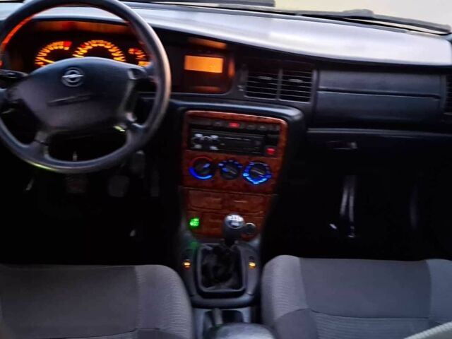 Синий Опель Вектра, объемом двигателя 1.8 л и пробегом 340 тыс. км за 2350 $, фото 16 на Automoto.ua