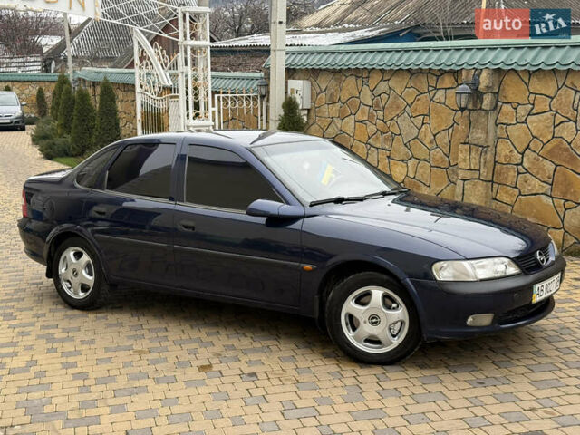 Синій Опель Вектра, об'ємом двигуна 2 л та пробігом 248 тис. км за 2550 $, фото 11 на Automoto.ua