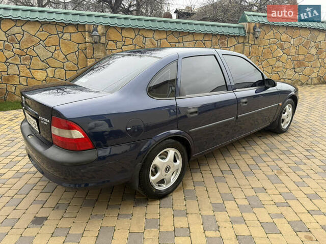 Синій Опель Вектра, об'ємом двигуна 2 л та пробігом 248 тис. км за 2550 $, фото 28 на Automoto.ua