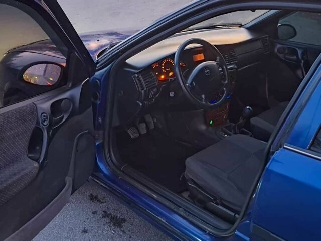 Синий Опель Вектра, объемом двигателя 1.8 л и пробегом 340 тыс. км за 2350 $, фото 12 на Automoto.ua