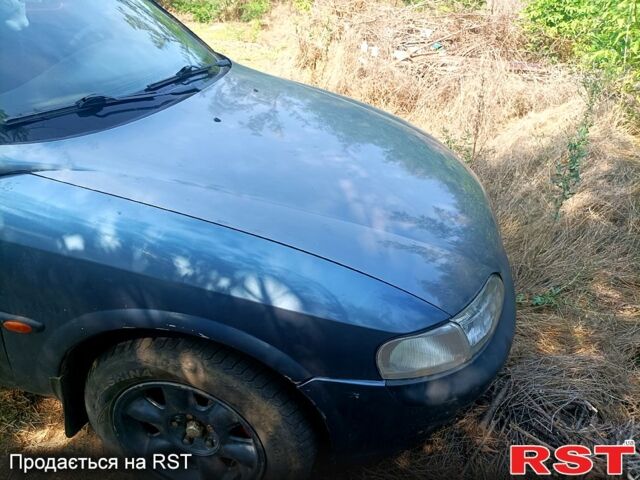 Синій Опель Вектра, об'ємом двигуна 2 л та пробігом 347 тис. км за 1800 $, фото 11 на Automoto.ua
