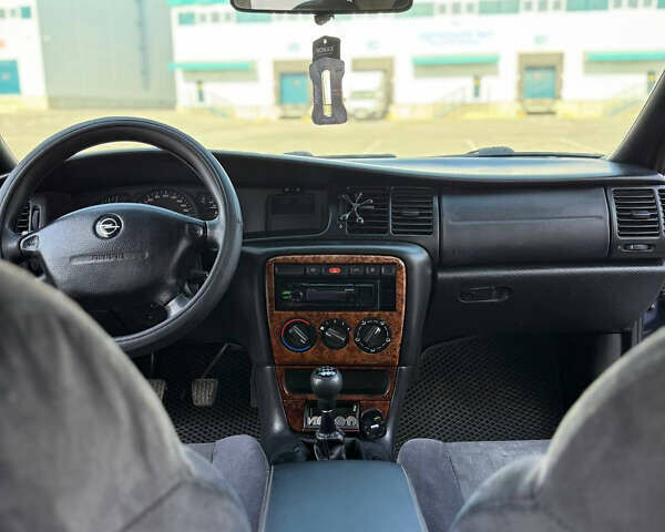 Синий Опель Вектра, объемом двигателя 1.6 л и пробегом 177 тыс. км за 2800 $, фото 19 на Automoto.ua