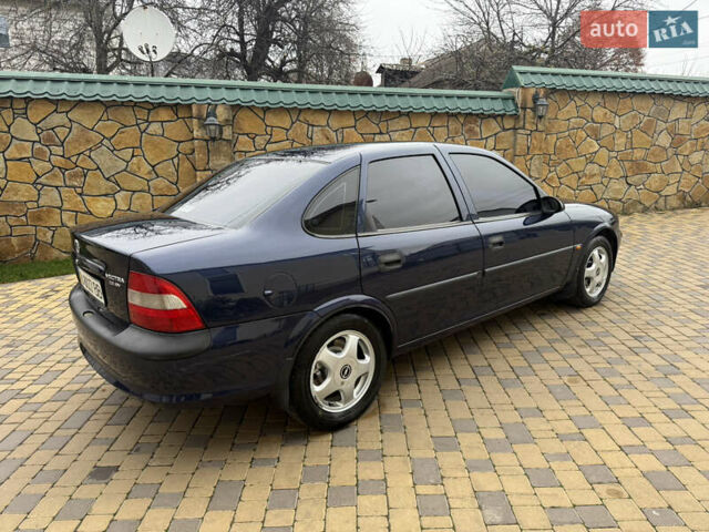 Синій Опель Вектра, об'ємом двигуна 2 л та пробігом 248 тис. км за 2550 $, фото 31 на Automoto.ua