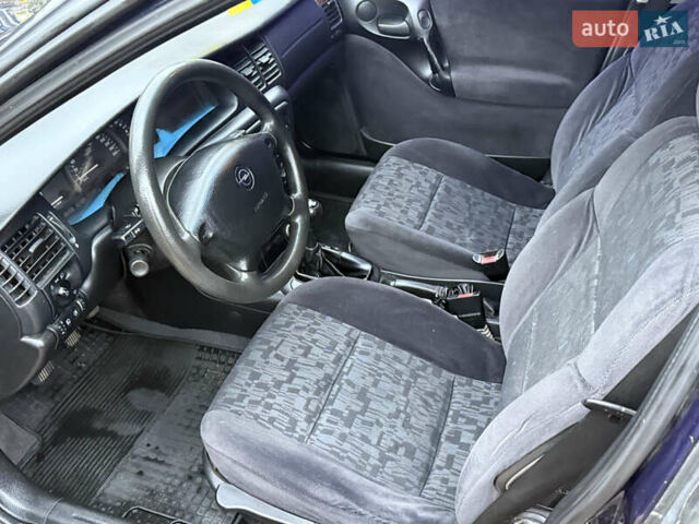 Синій Опель Вектра, об'ємом двигуна 2 л та пробігом 248 тис. км за 2550 $, фото 44 на Automoto.ua