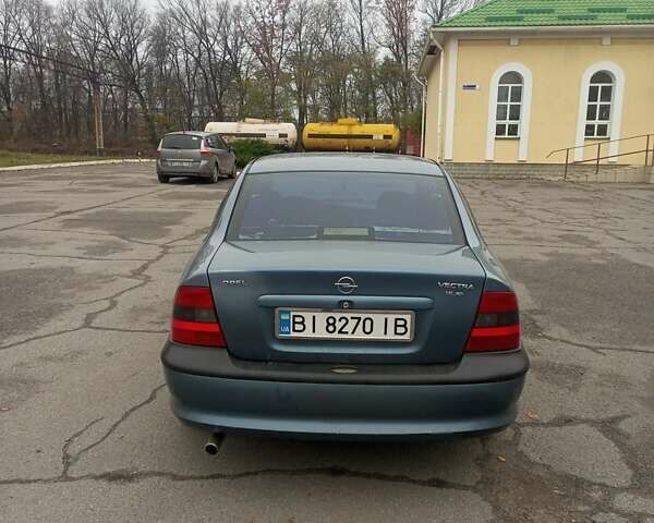 Синий Опель Вектра, объемом двигателя 1.6 л и пробегом 300 тыс. км за 2750 $, фото 5 на Automoto.ua