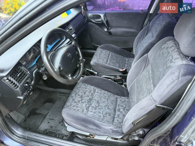 Синій Опель Вектра, об'ємом двигуна 2 л та пробігом 248 тис. км за 2550 $, фото 54 на Automoto.ua