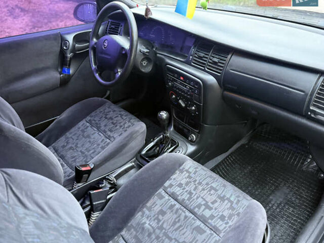 Синій Опель Вектра, об'ємом двигуна 2 л та пробігом 248 тис. км за 2550 $, фото 29 на Automoto.ua