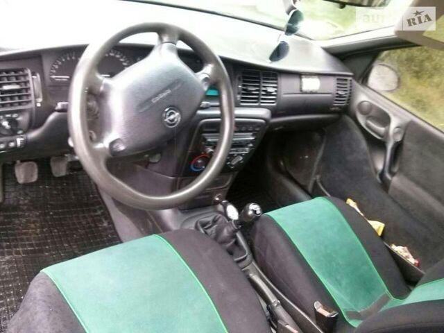 Синий Опель Вектра, объемом двигателя 1.8 л и пробегом 407 тыс. км за 1700 $, фото 2 на Automoto.ua