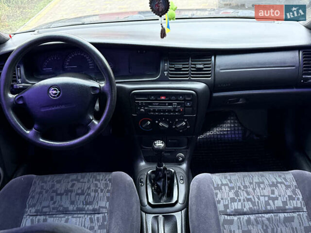 Синій Опель Вектра, об'ємом двигуна 2 л та пробігом 248 тис. км за 2550 $, фото 47 на Automoto.ua