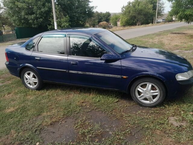 Синій Опель Вектра, об'ємом двигуна 2.5 л та пробігом 250 тис. км за 1919 $, фото 3 на Automoto.ua