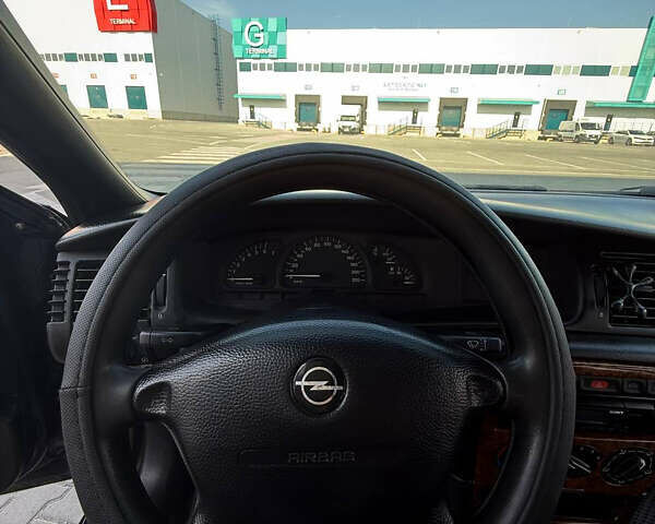 Синий Опель Вектра, объемом двигателя 1.6 л и пробегом 177 тыс. км за 2800 $, фото 21 на Automoto.ua