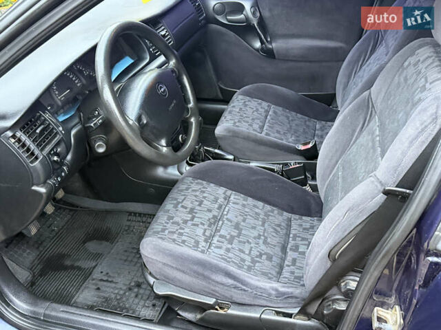 Синій Опель Вектра, об'ємом двигуна 2 л та пробігом 248 тис. км за 2550 $, фото 38 на Automoto.ua