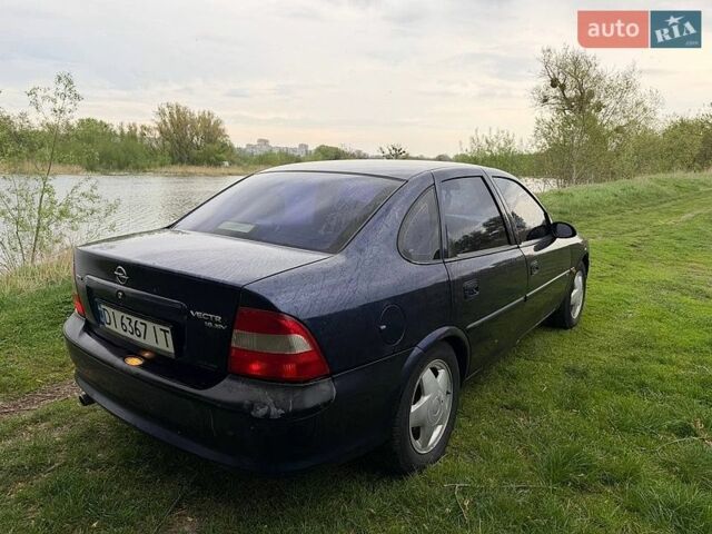 Синий Опель Вектра, объемом двигателя 1.6 л и пробегом 385 тыс. км за 999 $, фото 4 на Automoto.ua
