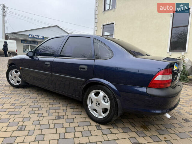 Синій Опель Вектра, об'ємом двигуна 2 л та пробігом 248 тис. км за 2550 $, фото 16 на Automoto.ua