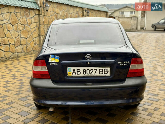 Синій Опель Вектра, об'ємом двигуна 2 л та пробігом 248 тис. км за 2550 $, фото 21 на Automoto.ua