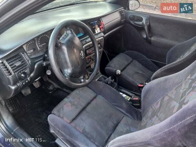 Синий Опель Вектра, объемом двигателя 1.8 л и пробегом 350 тыс. км за 1550 $, фото 3 на Automoto.ua