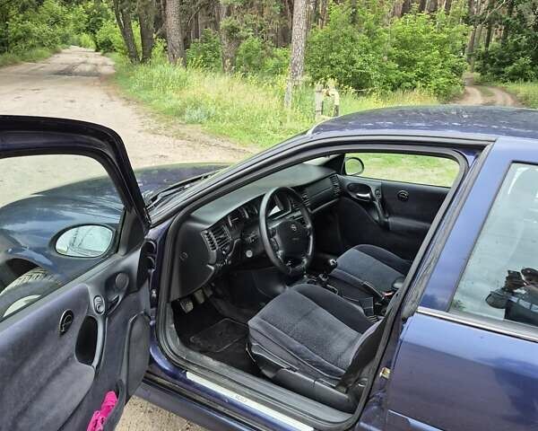 Синій Опель Вектра, об'ємом двигуна 1.8 л та пробігом 240 тис. км за 3300 $, фото 13 на Automoto.ua