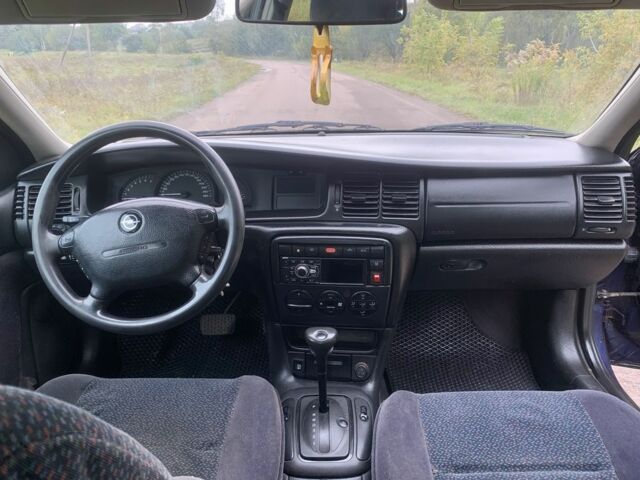 Синий Опель Вектра, объемом двигателя 2 л и пробегом 358 тыс. км за 3000 $, фото 9 на Automoto.ua