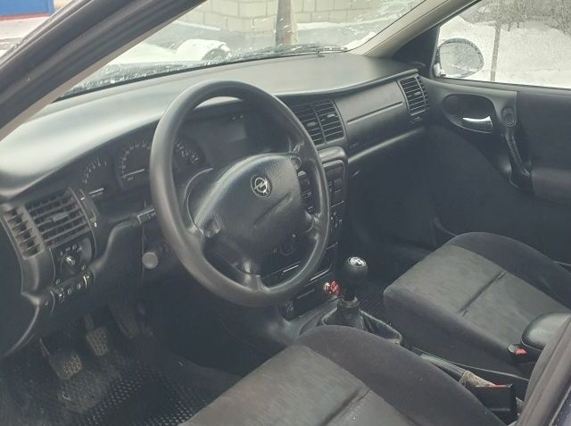 Синій Опель Вектра, об'ємом двигуна 1.6 л та пробігом 262 тис. км за 1600 $, фото 7 на Automoto.ua