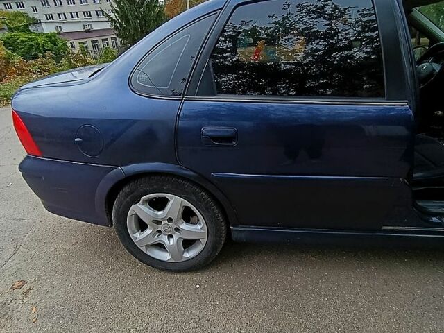 Синій Опель Вектра, об'ємом двигуна 1.8 л та пробігом 320 тис. км за 2500 $, фото 5 на Automoto.ua