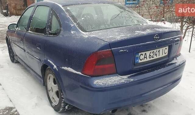Синий Опель Вектра, объемом двигателя 1.6 л и пробегом 262 тыс. км за 1600 $, фото 1 на Automoto.ua