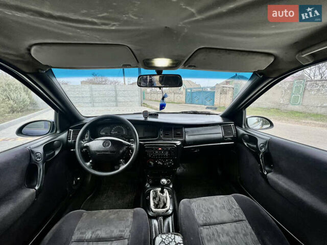 Синий Опель Вектра, объемом двигателя 1.8 л и пробегом 321 тыс. км за 850 $, фото 12 на Automoto.ua