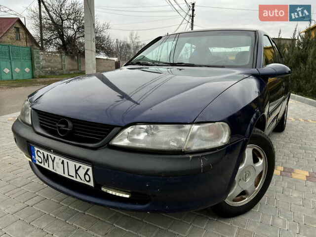 Синий Опель Вектра, объемом двигателя 1.8 л и пробегом 321 тыс. км за 850 $, фото 1 на Automoto.ua