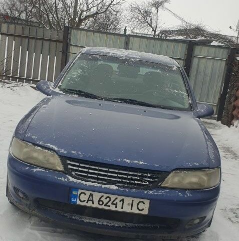 Синій Опель Вектра, об'ємом двигуна 1.6 л та пробігом 262 тис. км за 1600 $, фото 4 на Automoto.ua