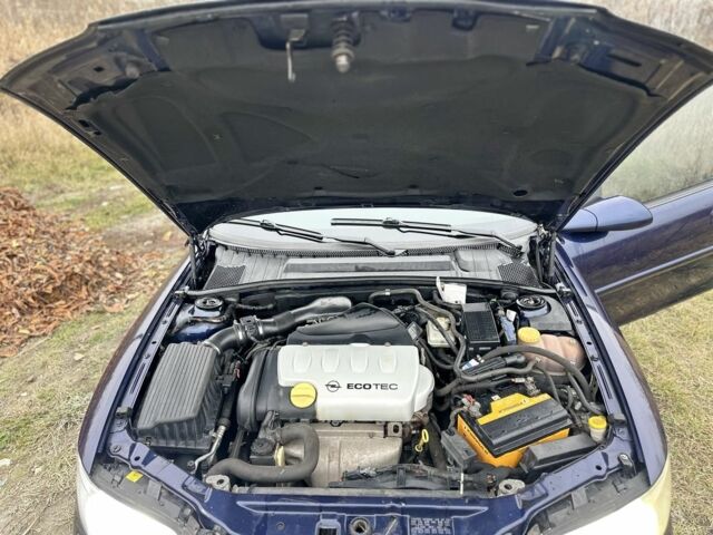 Синий Опель Вектра, объемом двигателя 1.8 л и пробегом 250 тыс. км за 2900 $, фото 6 на Automoto.ua