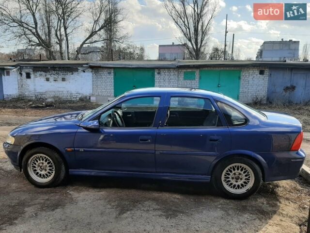 Синий Опель Вектра, объемом двигателя 2 л и пробегом 273 тыс. км за 4200 $, фото 2 на Automoto.ua
