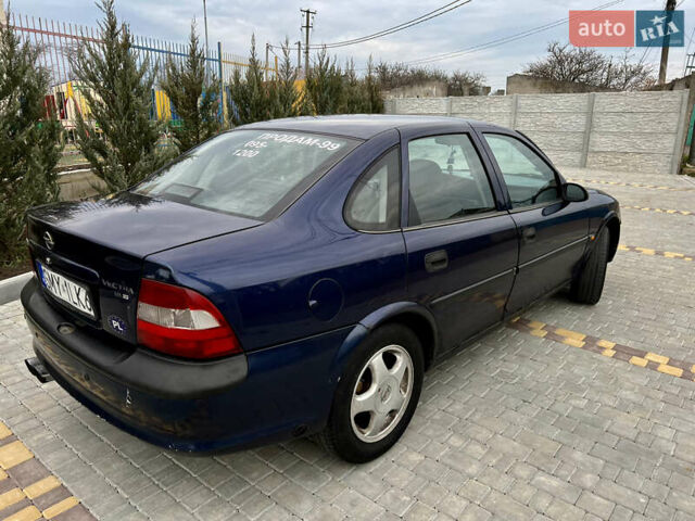 Синий Опель Вектра, объемом двигателя 1.8 л и пробегом 321 тыс. км за 850 $, фото 7 на Automoto.ua