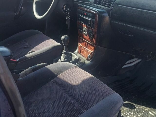 Синій Опель Вектра, об'ємом двигуна 2 л та пробігом 300 тис. км за 1500 $, фото 4 на Automoto.ua