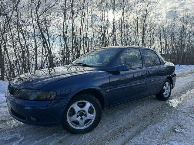 Синій Опель Вектра, об'ємом двигуна 2 л та пробігом 310 тис. км за 2000 $, фото 1 на Automoto.ua