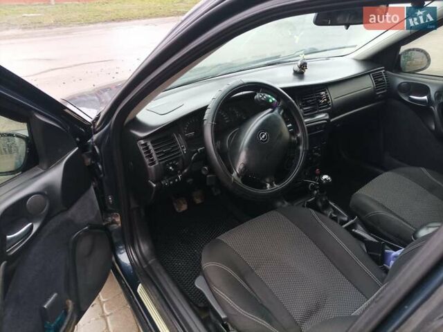 Синий Опель Вектра, объемом двигателя 1.8 л и пробегом 388 тыс. км за 2000 $, фото 15 на Automoto.ua