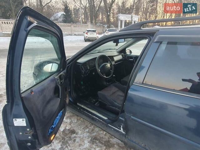 Синий Опель Вектра, объемом двигателя 1.8 л и пробегом 335 тыс. км за 2000 $, фото 5 на Automoto.ua