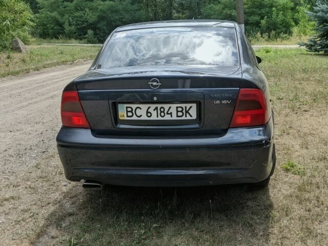 Синий Опель Вектра, объемом двигателя 1 л и пробегом 200 тыс. км за 1453 $, фото 3 на Automoto.ua