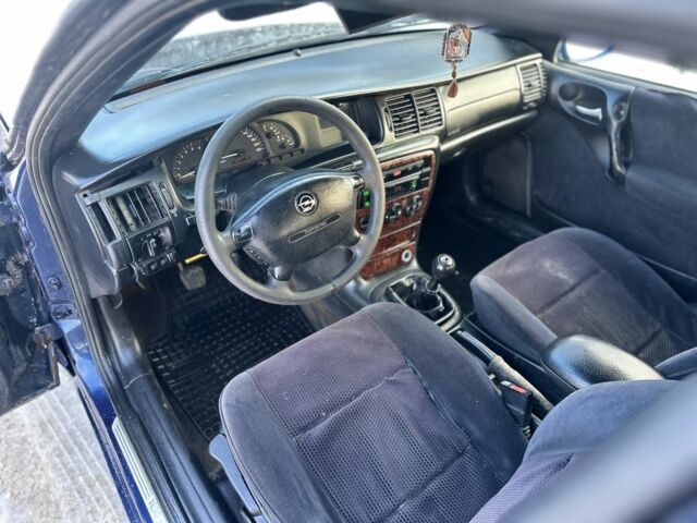 Синій Опель Вектра, об'ємом двигуна 2 л та пробігом 310 тис. км за 2000 $, фото 11 на Automoto.ua