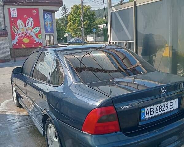Синий Опель Вектра, объемом двигателя 2.2 л и пробегом 242 тыс. км за 2800 $, фото 4 на Automoto.ua