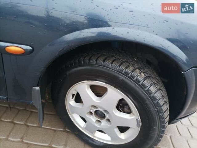 Синий Опель Вектра, объемом двигателя 1.8 л и пробегом 388 тыс. км за 2000 $, фото 11 на Automoto.ua