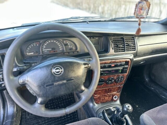 Синій Опель Вектра, об'ємом двигуна 2 л та пробігом 310 тис. км за 2000 $, фото 12 на Automoto.ua