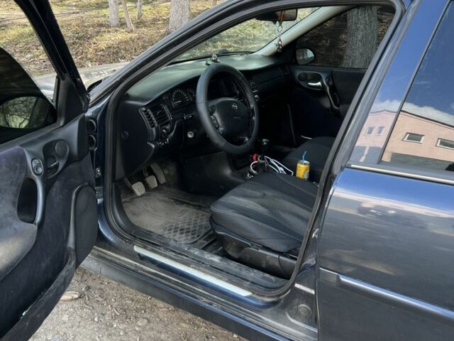 Синий Опель Вектра, объемом двигателя 1.8 л и пробегом 300 тыс. км за 1700 $, фото 4 на Automoto.ua