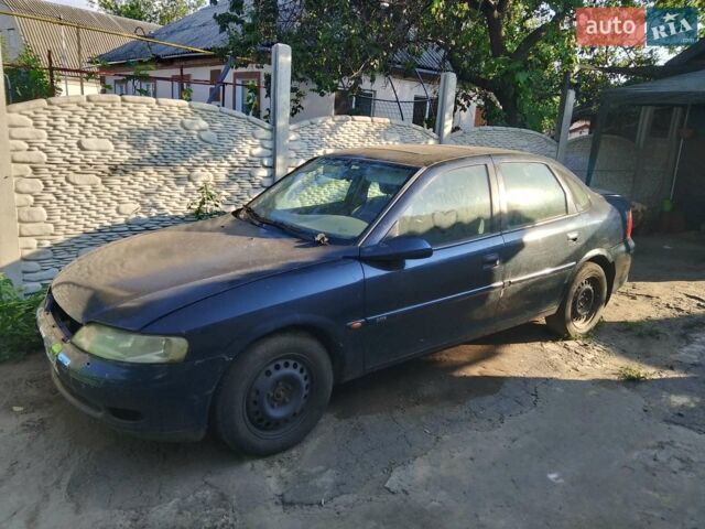 Синий Опель Вектра, объемом двигателя 2 л и пробегом 100 тыс. км за 500 $, фото 2 на Automoto.ua
