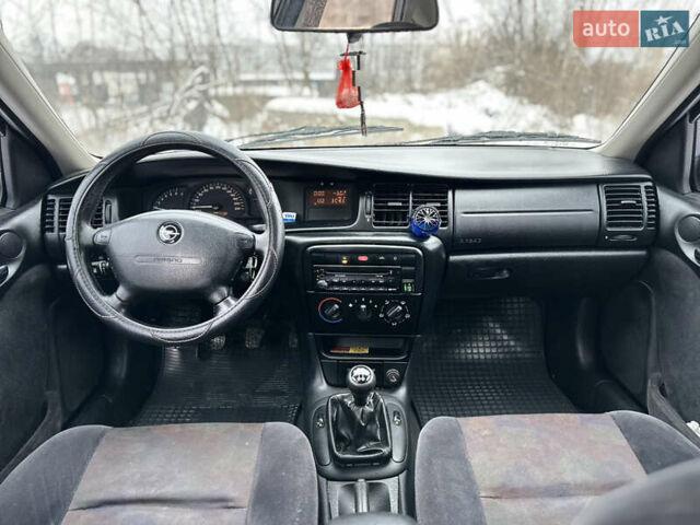 Синий Опель Вектра, объемом двигателя 1.6 л и пробегом 225 тыс. км за 2999 $, фото 10 на Automoto.ua