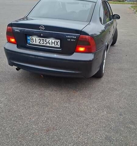 Синий Опель Вектра, объемом двигателя 1.8 л и пробегом 330 тыс. км за 3700 $, фото 1 на Automoto.ua