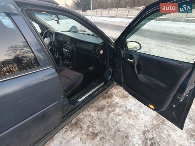 Синий Опель Вектра, объемом двигателя 1.8 л и пробегом 335 тыс. км за 2000 $, фото 6 на Automoto.ua