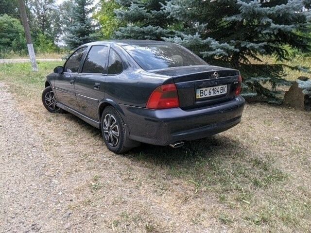 Синий Опель Вектра, объемом двигателя 1 л и пробегом 200 тыс. км за 1453 $, фото 1 на Automoto.ua