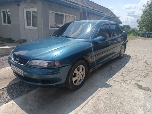 Синий Опель Вектра, объемом двигателя 1.6 л и пробегом 345 тыс. км за 2600 $, фото 4 на Automoto.ua