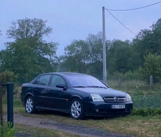 Синий Опель Вектра, объемом двигателя 2.2 л и пробегом 310 тыс. км за 2400 $, фото 4 на Automoto.ua
