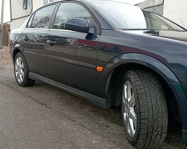 Синий Опель Вектра, объемом двигателя 2.2 л и пробегом 270 тыс. км за 5000 $, фото 3 на Automoto.ua